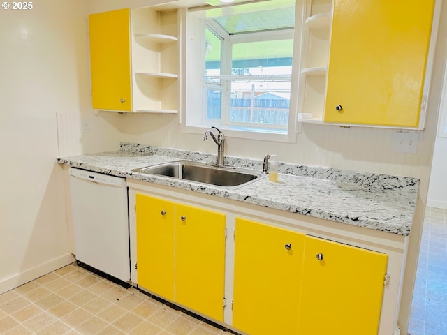 kitchen with open shelves, a sink, yellow cabinets, dishwasher, and baseboards