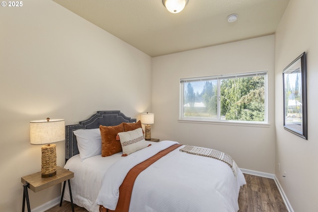 bedroom featuring wood-type flooring