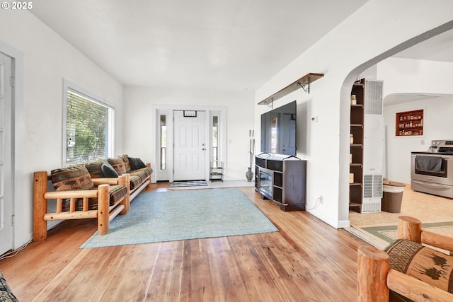 803 Main St, Philomath, OR 97370 - foyer entrance featuring arched walkways and light wood finished floors