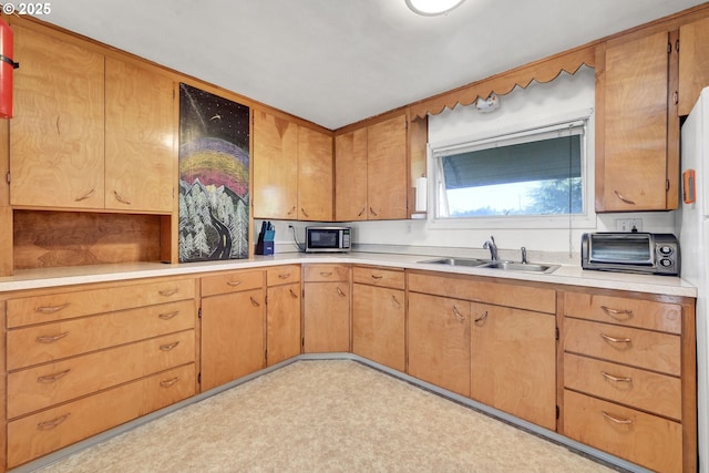803 Main St, Philomath, OR 97370 - kitchen with a sink, stainless steel microwave, light countertops, and light floors