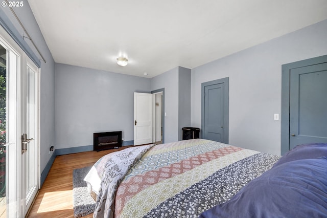 803 Main St, Philomath, OR 97370 - bedroom with light wood finished floors and baseboards