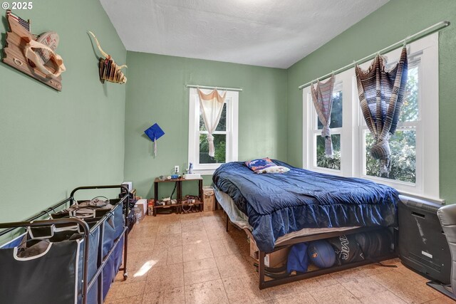 803 Main St, Philomath, OR 97370 - bedroom featuring multiple windows and tile patterned floors