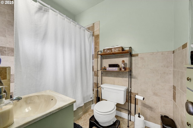 803 Main St, Philomath, OR 97370 - full bath featuring tile walls, toilet, vanity, and a shower with curtain