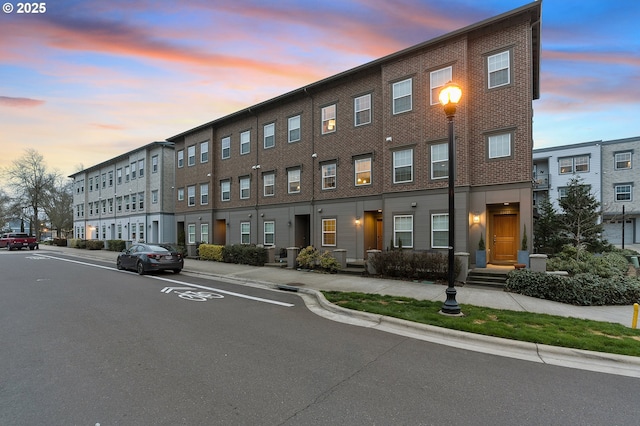 view of property at dusk