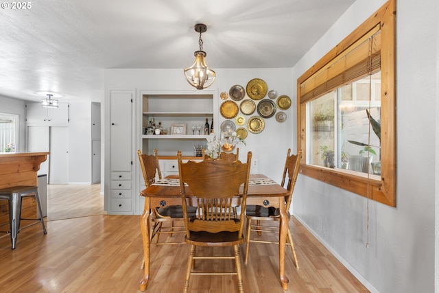 1175 Northside Rd, Sutherlin, OR 97479 - dining space featuring a chandelier and light wood-type flooring