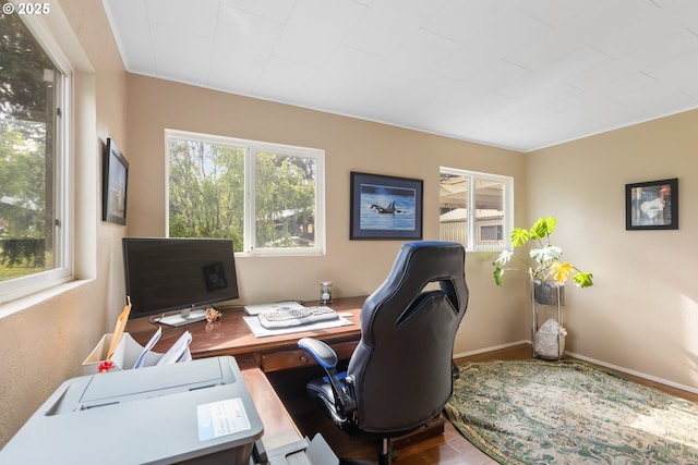 1175 Northside Rd, Sutherlin, OR 97479 - office area with healthy amount of natural light, wood finished floors, and baseboards