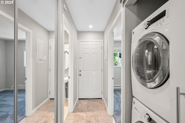 4 Touchstone # 138, Lake Oswego, OR 97035 - laundry area with estacked washer and dryer, baseboards, and recessed lighting
