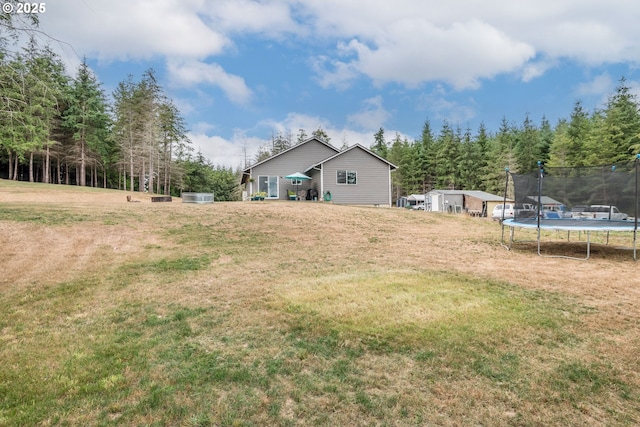 view of yard featuring a trampoline