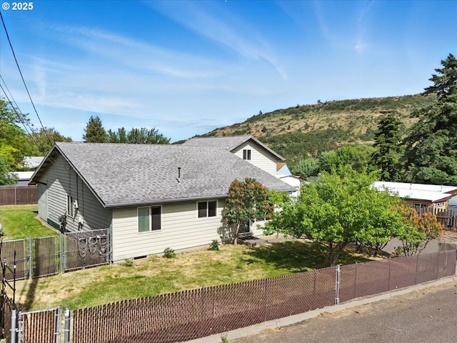 1021 Starlight St, The Dalles, OR 97058 - view of front of property with a gate and a shingled roof