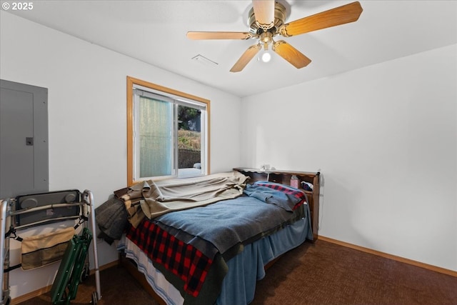 1021 Starlight St, The Dalles, OR 97058 - bedroom with electric panel, baseboards, carpet floors, and a ceiling fan