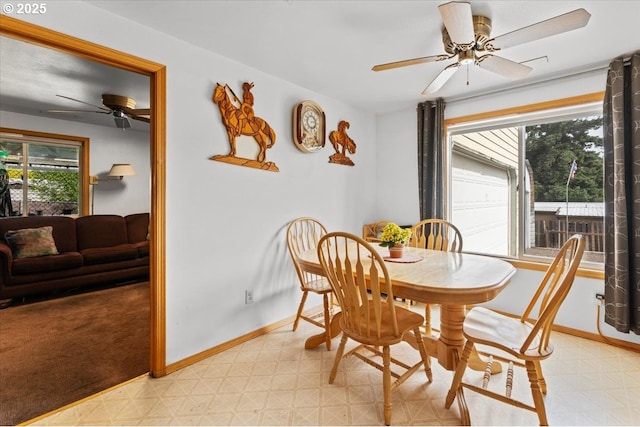 1021 Starlight St, The Dalles, OR 97058 - dining area with light floors, a ceiling fan, and baseboards