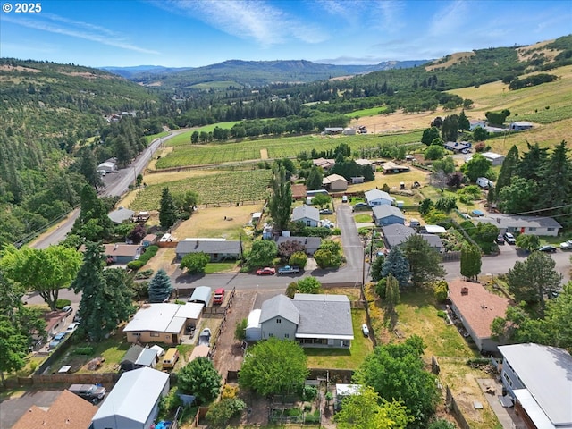 1021 Starlight St, The Dalles, OR 97058 - aerial view of property and surrounding area featuring mountains and rural landscape
