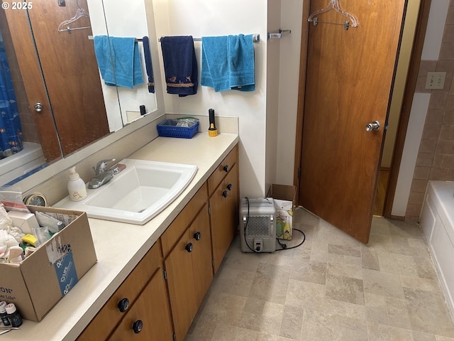 bathroom with vanity and shower / tub combo with curtain