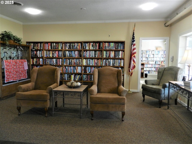 living area with ornamental molding and carpet flooring