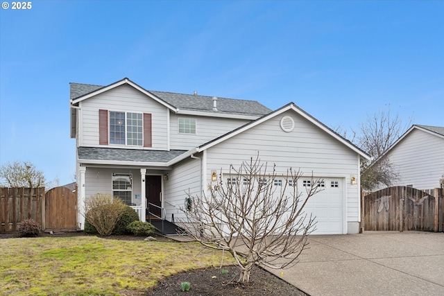 view of front of home with a garage and a front lawn