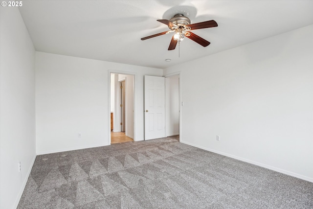 unfurnished bedroom with ceiling fan and carpet flooring