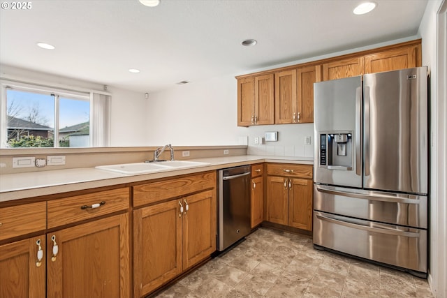 kitchen featuring appliances with stainless steel finishes and sink