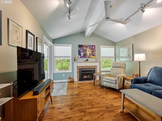 2235 Juntura Ct S, Salem, OR 97302 - living area with rail lighting, ceiling fan, and a fireplace