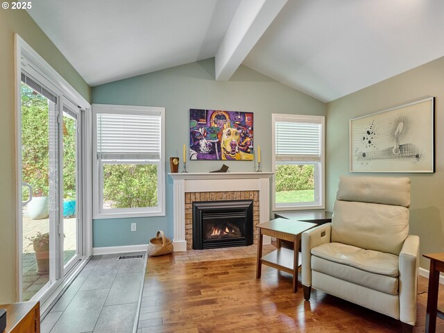 2235 Juntura Ct S, Salem, OR 97302 - sitting room featuring lofted ceiling with beams, plenty of natural light, wood finished floors, and visible vents