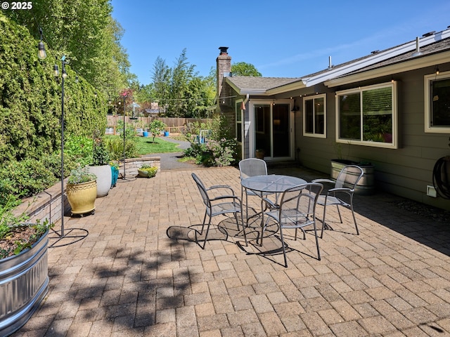 2235 Juntura Ct S, Salem, OR 97302 - view of patio / terrace featuring a fenced backyard and outdoor dining space