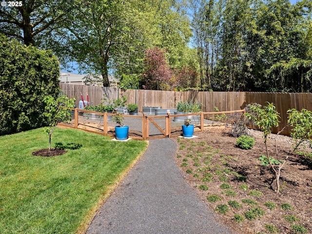 2235 Juntura Ct S, Salem, OR 97302 - view of yard featuring a fenced backyard and a vegetable garden