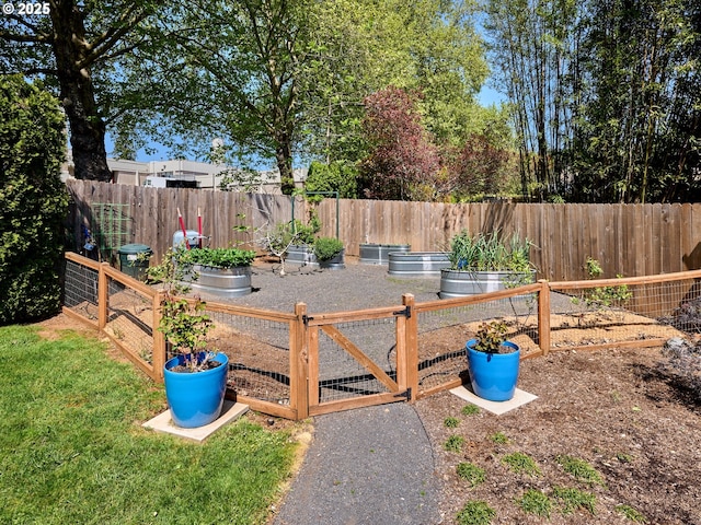 2235 Juntura Ct S, Salem, OR 97302 - view of yard with a fenced backyard and a vegetable garden