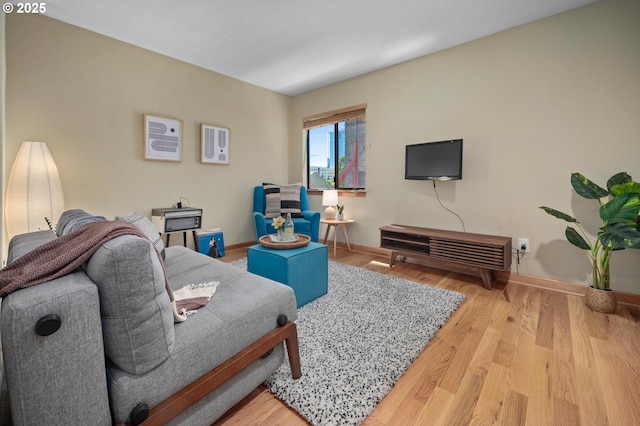 1040 NW Naito Pkwy Unit O-10, Portland, OR 97209 - living room featuring wood finished floors