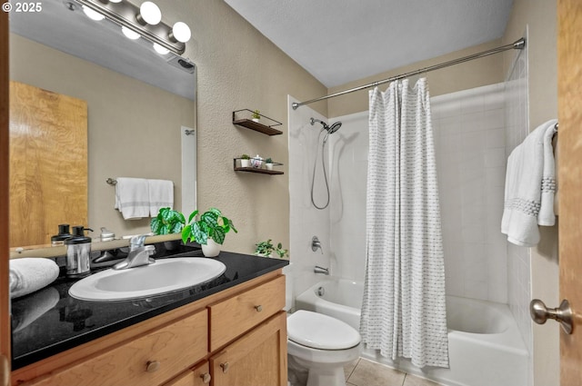 1040 NW Naito Pkwy Unit O-10, Portland, OR 97209 - bathroom with a textured wall, shower / tub combo with curtain, vanity, and tile patterned floors