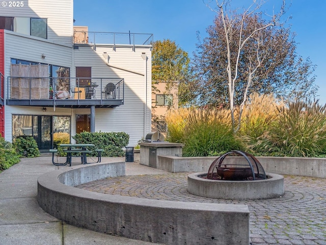1040 NW Naito Pkwy Unit O-10, Portland, OR 97209 - patio / terrace with a fire pit and a patio area