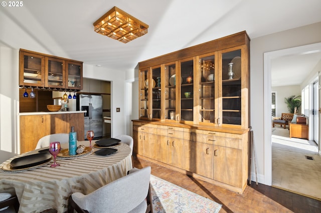 dining space featuring hardwood / wood-style flooring