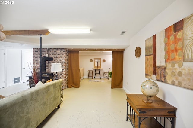 living room with a wood stove