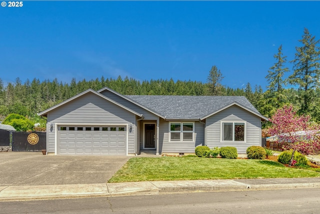 1545 E Fourth Ave, Sutherlin, OR 97479 - ranch-style home featuring a garage, concrete driveway, and a shingled roof