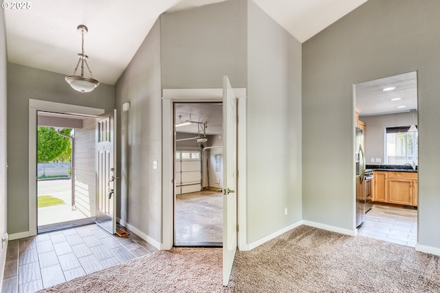 1545 E Fourth Ave, Sutherlin, OR 97479 - entryway featuring vaulted ceiling and baseboards