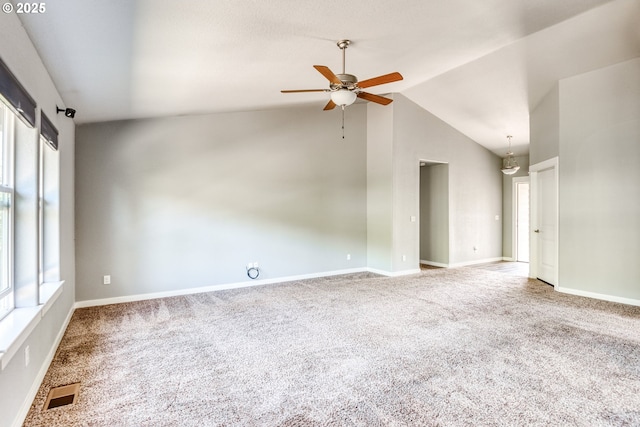 1545 E Fourth Ave, Sutherlin, OR 97479 - carpeted empty room featuring a ceiling fan, baseboards, and high vaulted ceiling