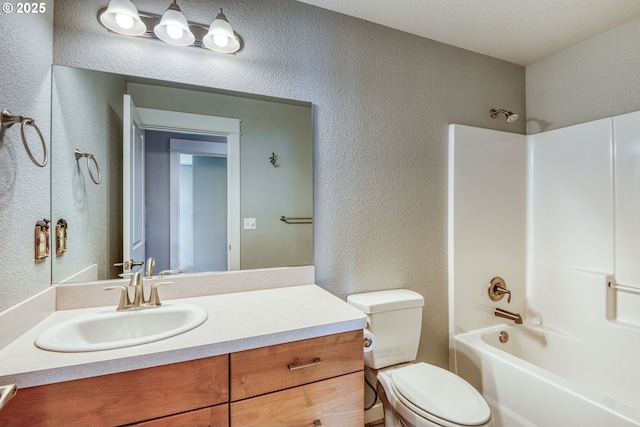 1545 E Fourth Ave, Sutherlin, OR 97479 - bathroom featuring a textured wall, bathing tub / shower combination, vanity, and toilet