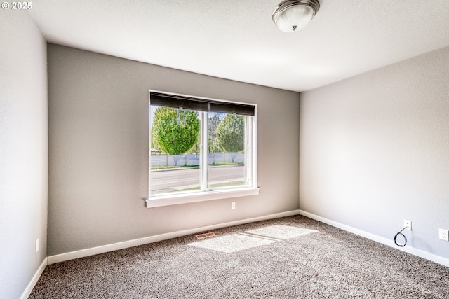 1545 E Fourth Ave, Sutherlin, OR 97479 - unfurnished room with carpet floors and baseboards
