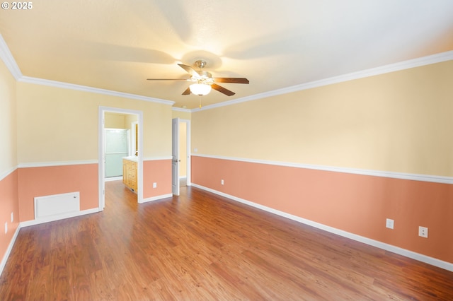 unfurnished room featuring hardwood / wood-style flooring, ornamental molding, and ceiling fan