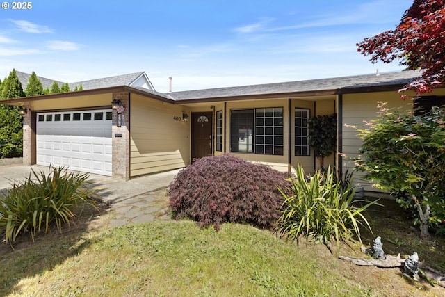 400 S 28th Ave, Cornelius, OR 97113 - ranch-style house with an attached garage, driveway, and brick siding