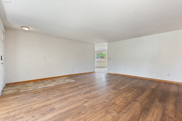 400 S 28th Ave, Cornelius, OR 97113 - spare room featuring light wood-type flooring and baseboards