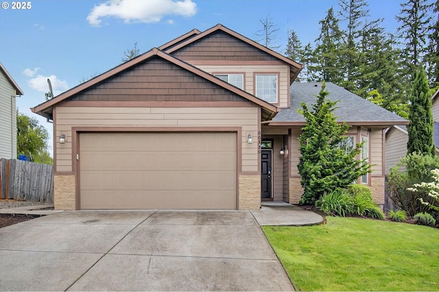 view of front of house featuring fence, driveway, a front yard, and a garage