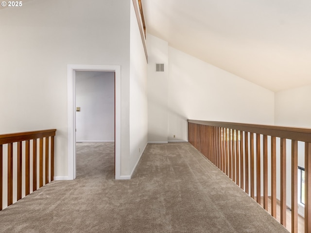 7785 SW W Slope Dr, Portland, OR 97225 - corridor featuring lofted ceiling and carpet flooring