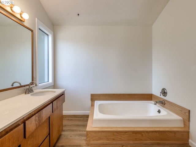 7785 SW W Slope Dr, Portland, OR 97225 - full bath with a bath, vanity, and wood finished floors