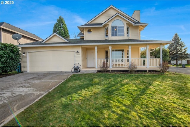 view of front of home with a garage, a front lawn, and a porch