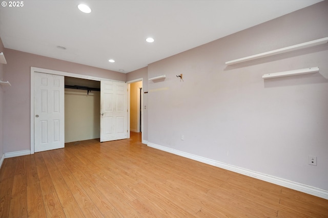 7080 SW Taylors Ferry Rd, Portland, OR 97223 - unfurnished bedroom with baseboards, light wood-style flooring, recessed lighting, and a closet