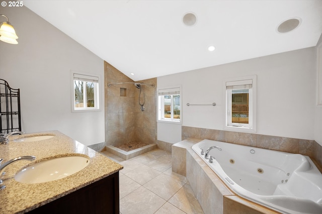 7080 SW Taylors Ferry Rd, Portland, OR 97223 - bathroom featuring a whirlpool tub, a tile shower, vaulted ceiling, plenty of natural light, and tile patterned floors