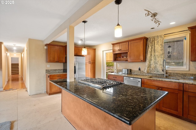 7080 SW Taylors Ferry Rd, Portland, OR 97223 - kitchen with stainless steel appliances, a sink, a center island, brown cabinetry, and open shelves