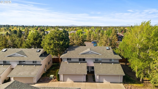 1801 NE Purcell Blvd Unit 21, Bend, OR 97701 - aerial view of property and surrounding area featuring a mountain backdrop
