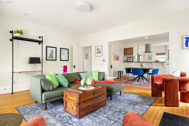 2904 NE 51st Ave, Portland, OR 97213 - living room featuring wood finished floors and baseboards