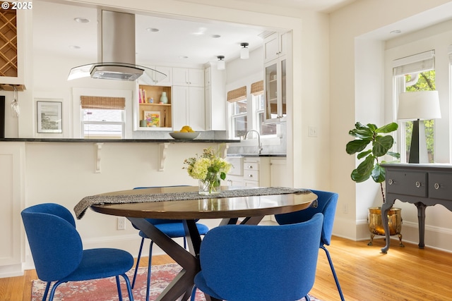 2904 NE 51st Ave, Portland, OR 97213 - dining area featuring light wood finished floors and baseboards