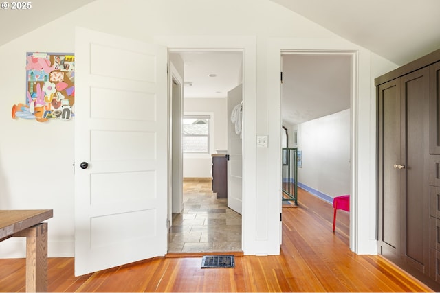 2904 NE 51st Ave, Portland, OR 97213 - hallway with light wood-style floors, baseboards, and lofted ceiling
